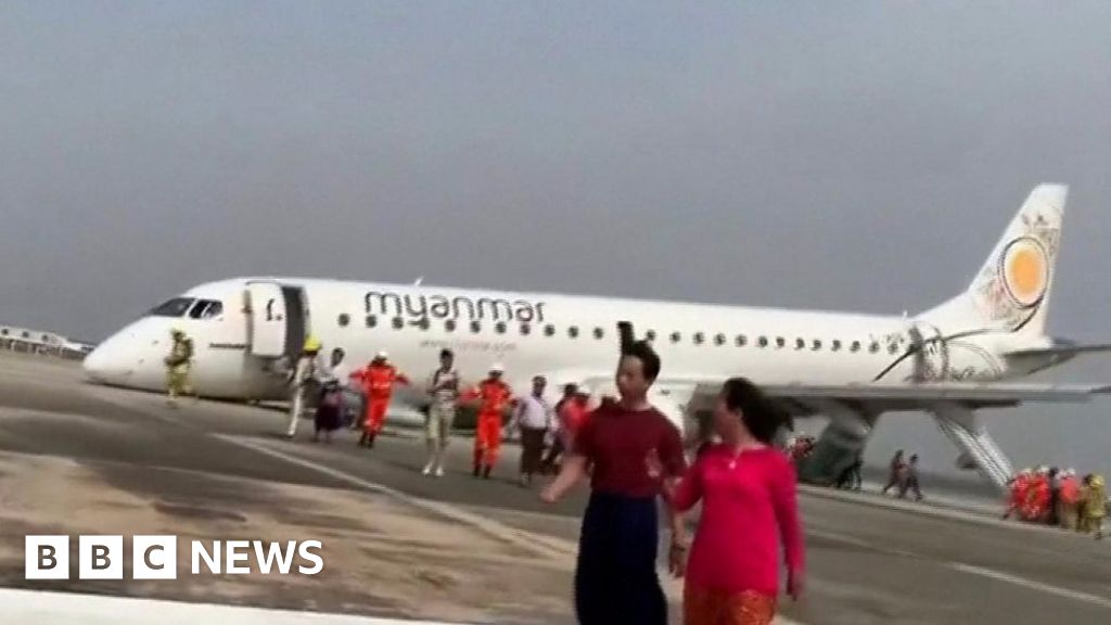 Pilot in Myanmar lands plane without front wheels BBC News
