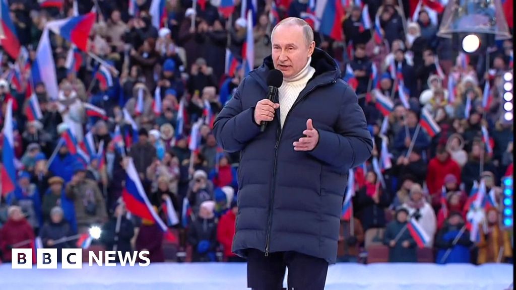 Putin hails Crimea annexation and war with lessons on heroism