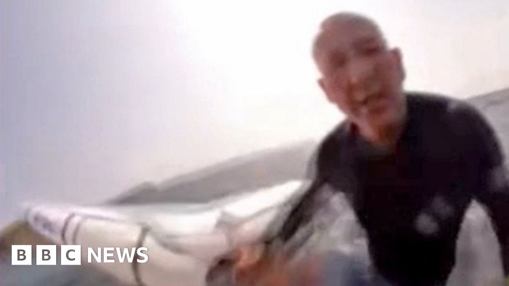 Sydney surfer collides with whale