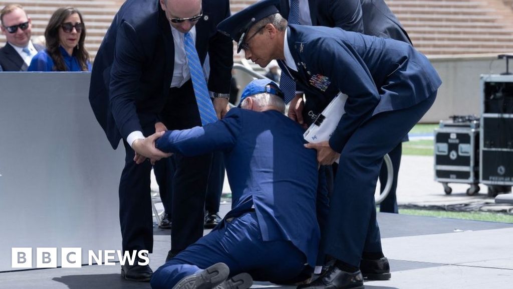 US President Joe Biden trips and falls at Colorado event