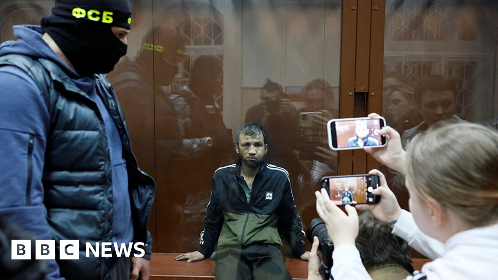 Four in court as Moscow attack death toll nears 140