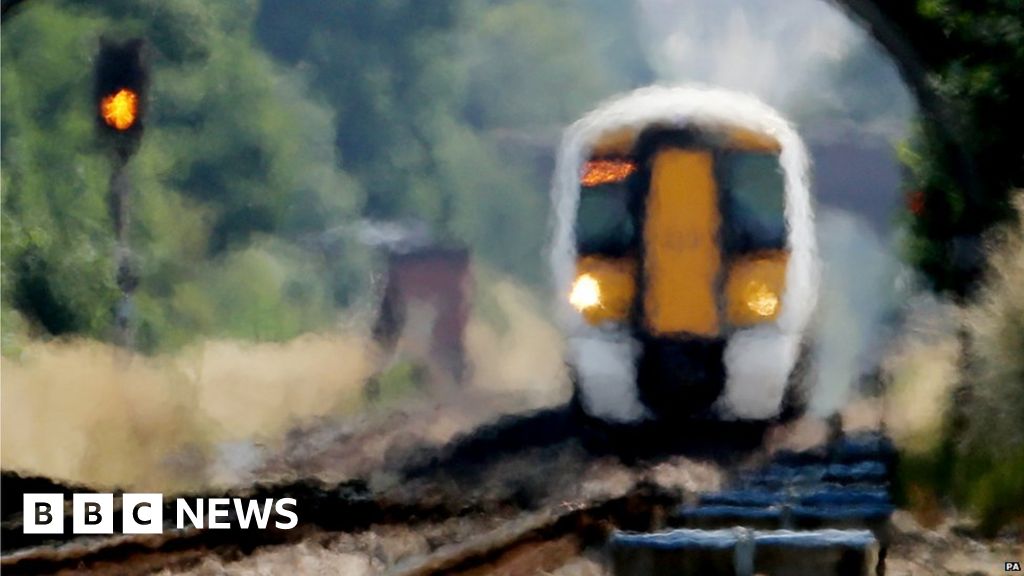 Commuter train seen through a heat haze