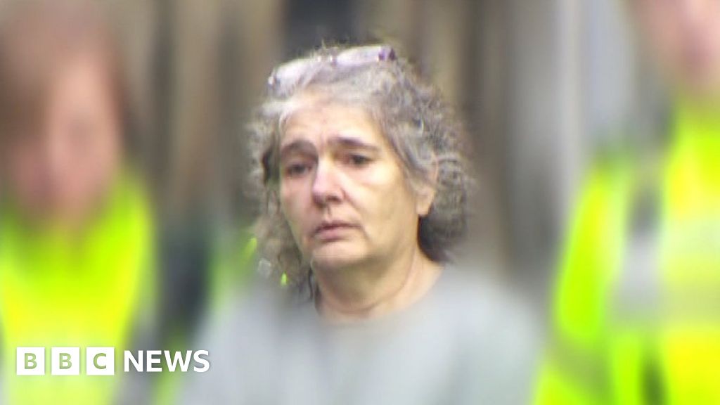 Ballymena woman who lived with partner's corpse jailed - BBC News