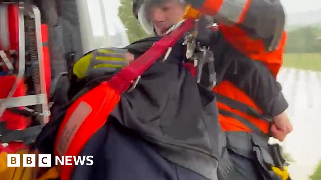 Elderly couple rescued from roof amid Italy floods