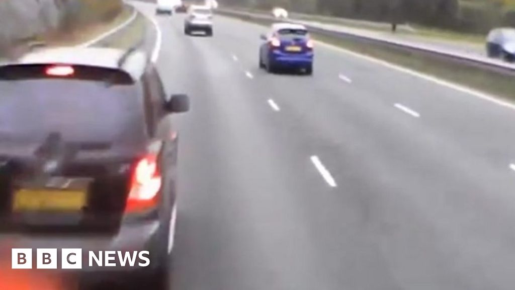 Dash cam captures Rhuallt Hill lorry crash into stopped car - BBC News