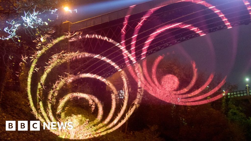 Festival of light illuminates canal bridge