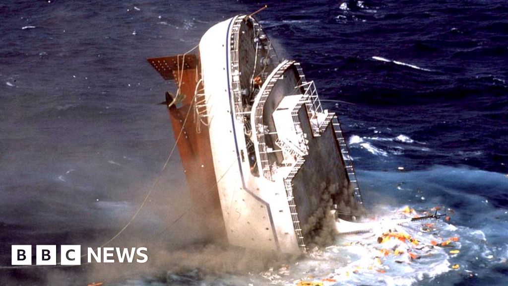 cruise ship sinking at night