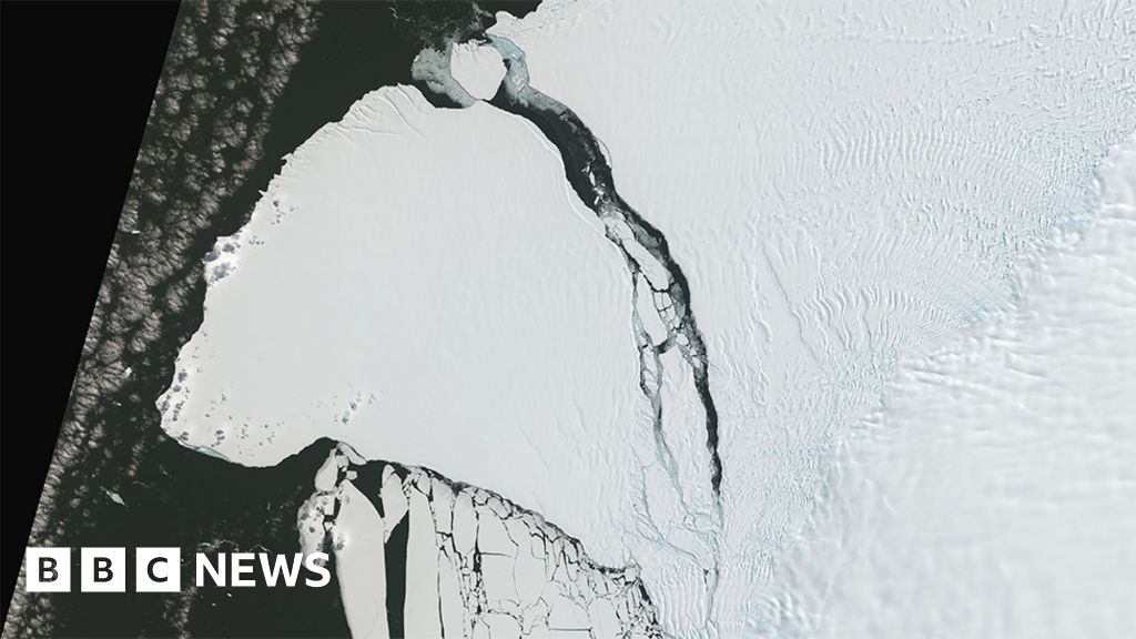 Clouds part to reveal colossal Antarctic iceberg
