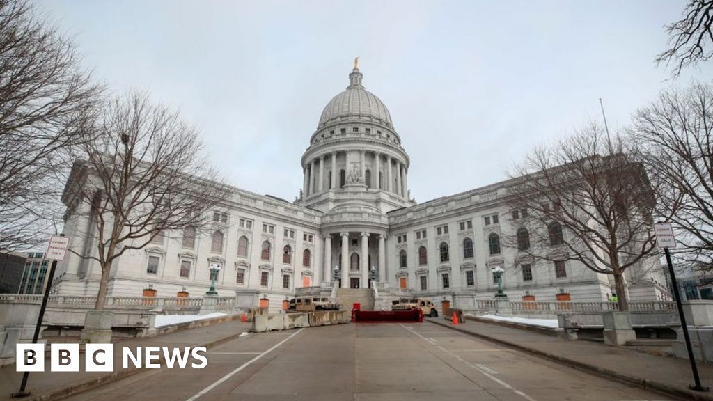 Armed man looking for Wisconsin Governor Evers returns with rifle