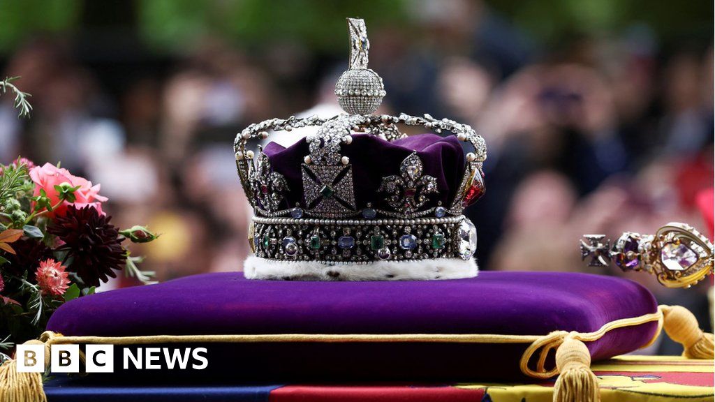 The dazzling crown which sat on the Queen's coffin