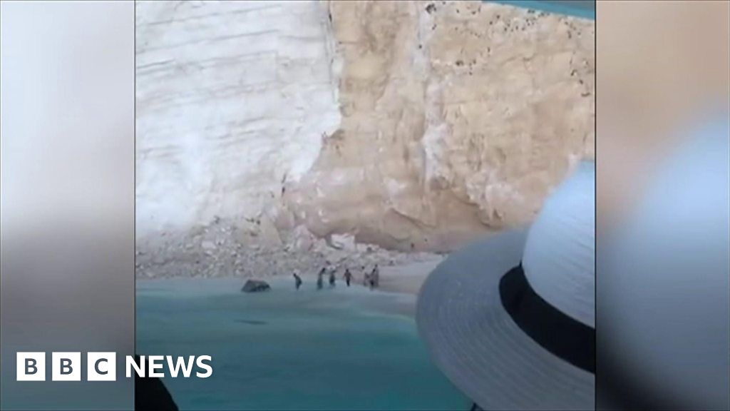 Holidaymakers film aftermath of cliff collapse