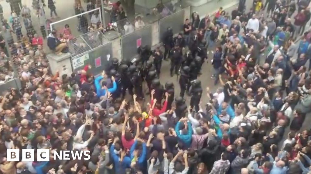 Police Use Batons On Crowd Bbc News 