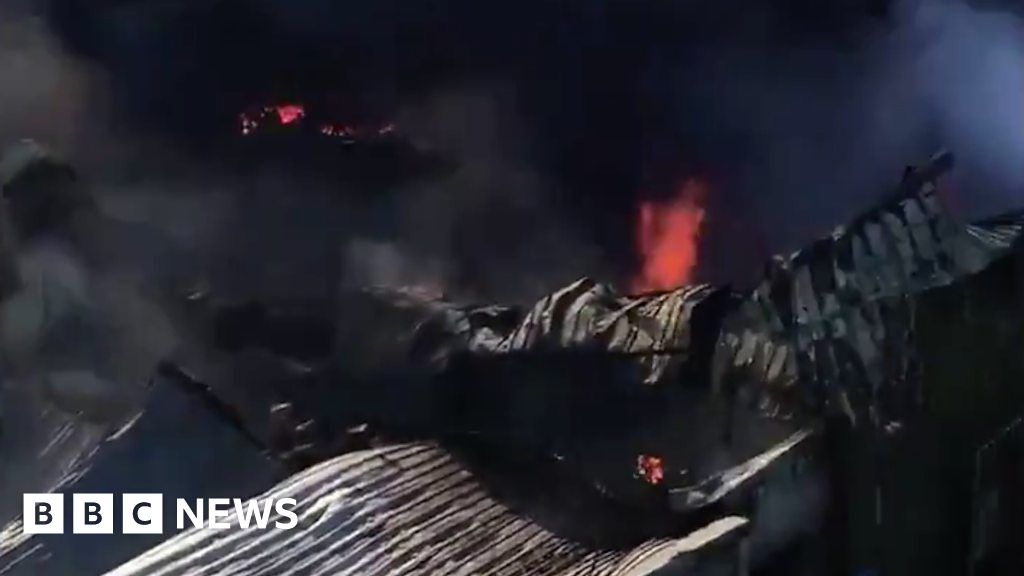 Aerial pictures show Corkers Crisps factory gutted by fire - BBC News