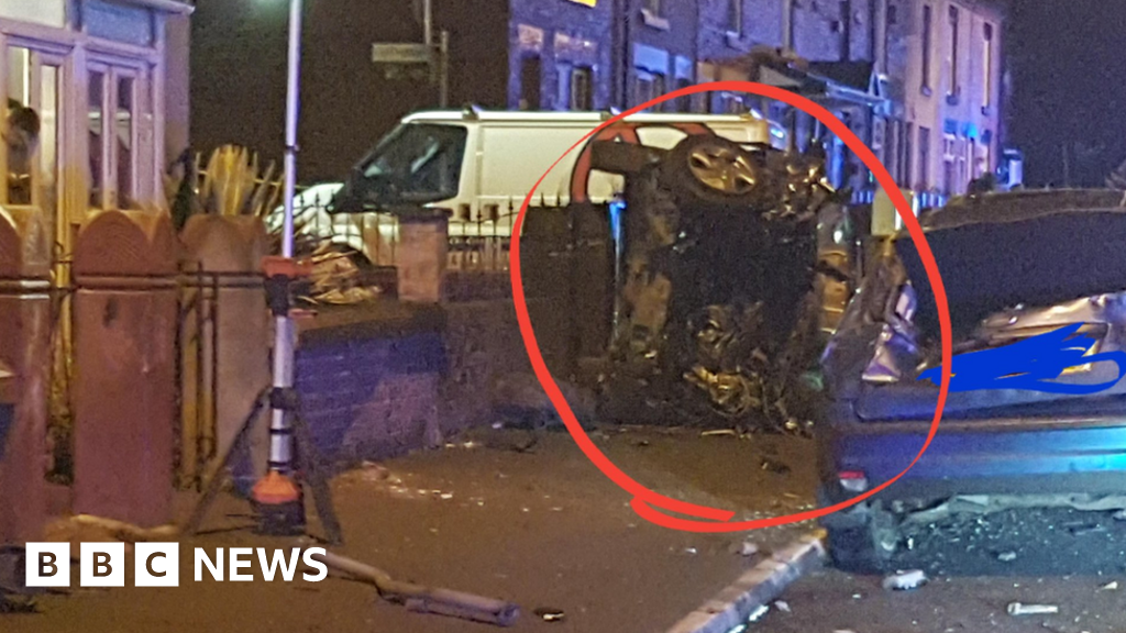 Gatepost flies into Bolton home after car crashes in police chase