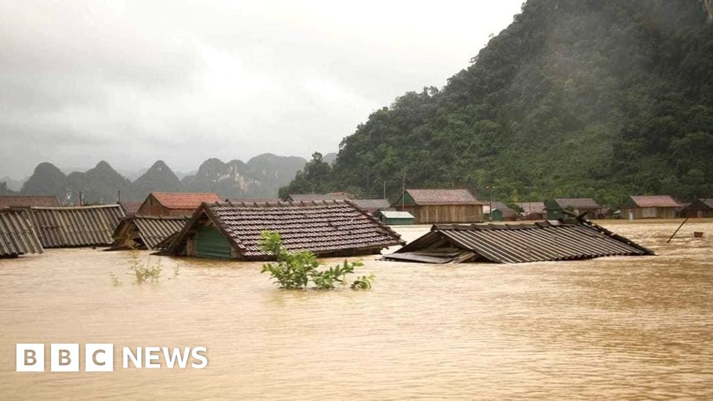 Vietnam battles its deadliest floods for decades