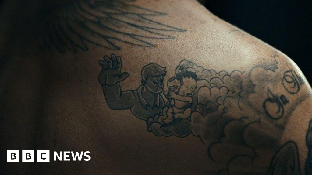 David Beckham tattoos come to life for child abuse campaign - BBC News