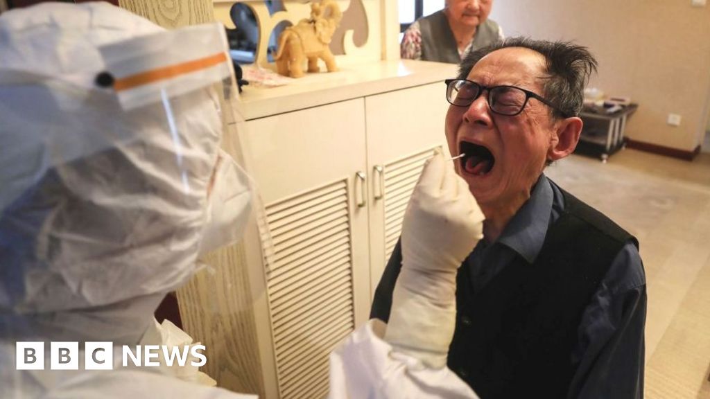 China: The elderly people struggling in Shanghai's quarantine centres - BBC