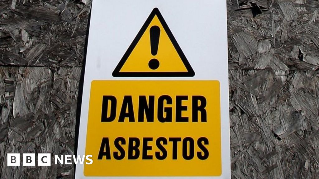 MPs say asbestos must go from public buildings within 40 years