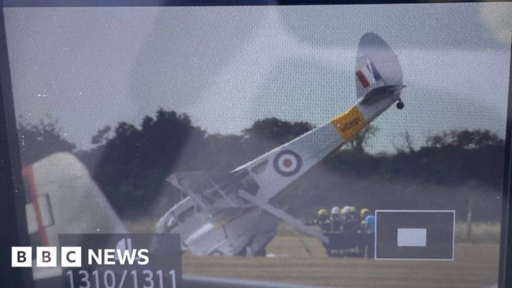 Duxford: Nine Rescued As Plane Ends Up Nose Down After Landing