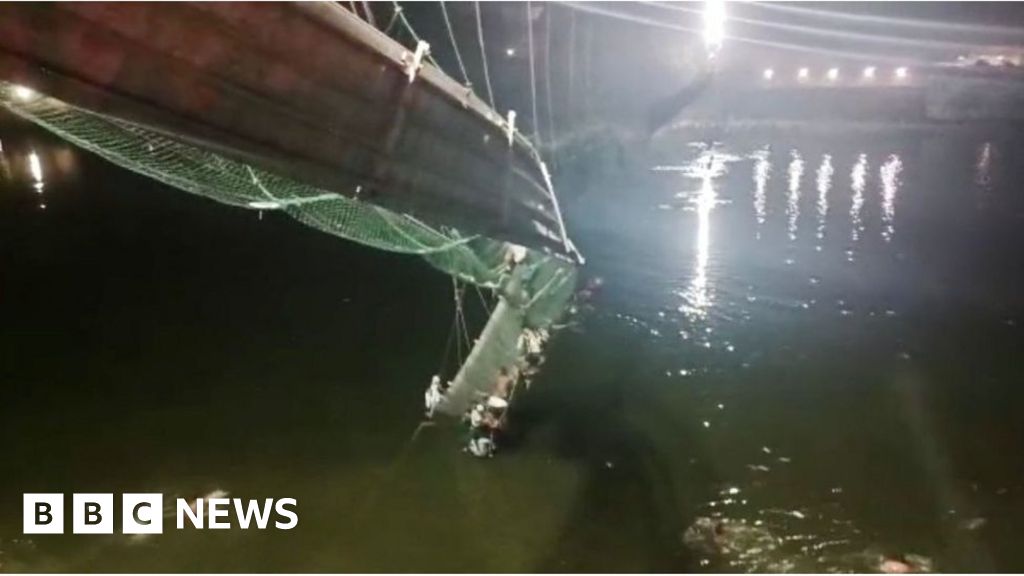 India bridge collapse: Hundreds plunged into river and dozens killed in Gujarat – BBC