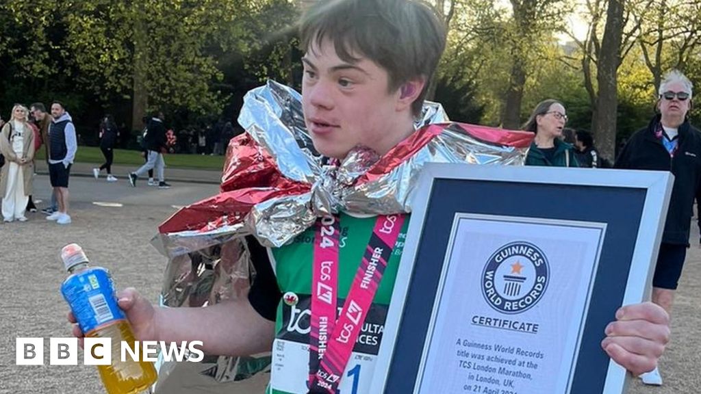 Lloyd Martin: Runner with Down's syndrome gets youngest record