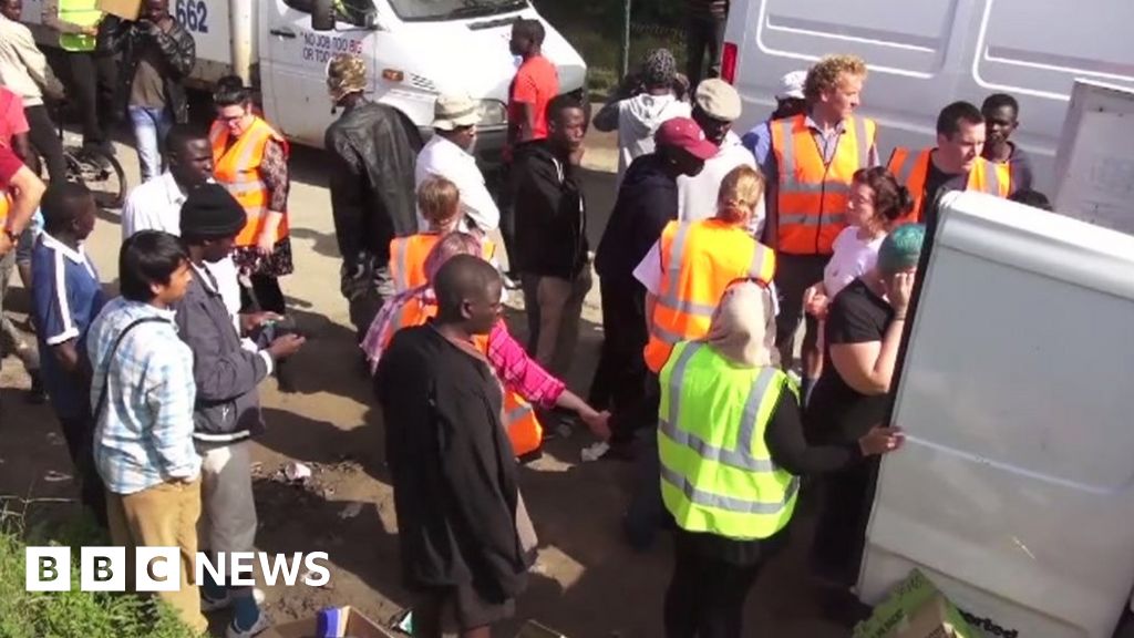 North East volunteers hand aid to Calais refugees BBC News