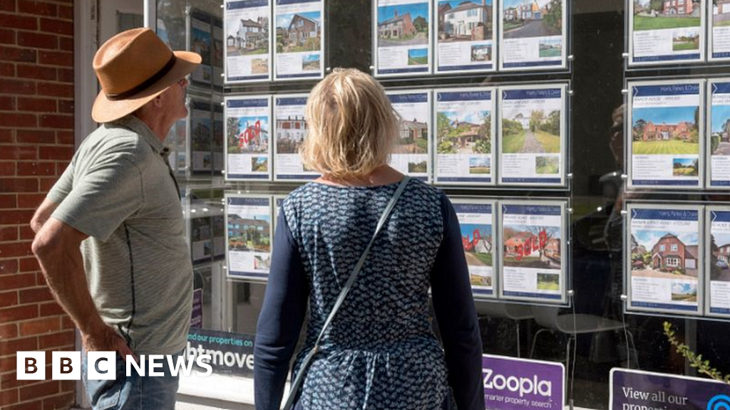 House prices defy expectations to hit record