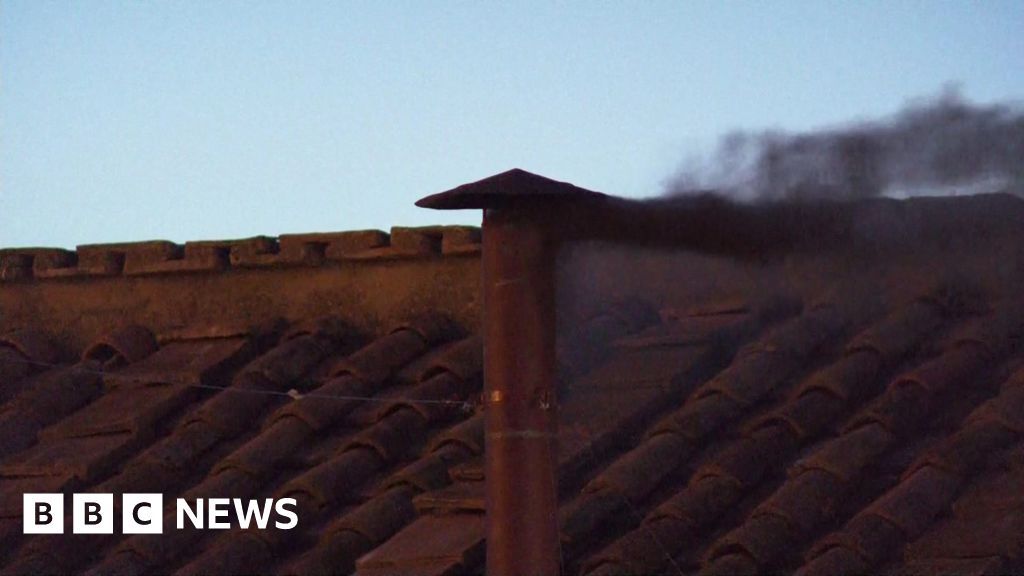 Watch: Cheers and gasps as first smoke emerges from Sistine Chapel chimney