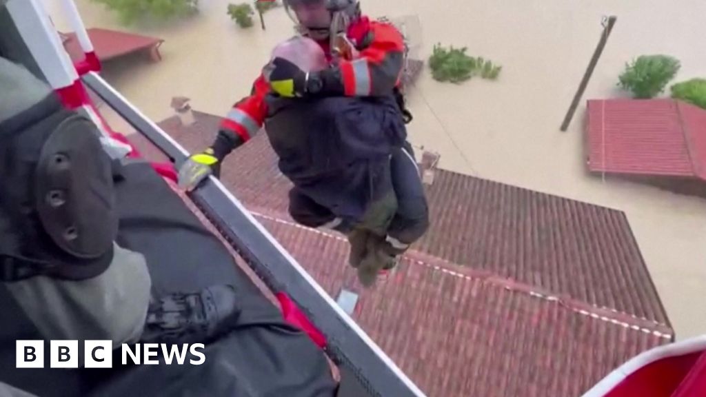 Watch: Elderly couple rescued from rooftop in deadly Italy floods