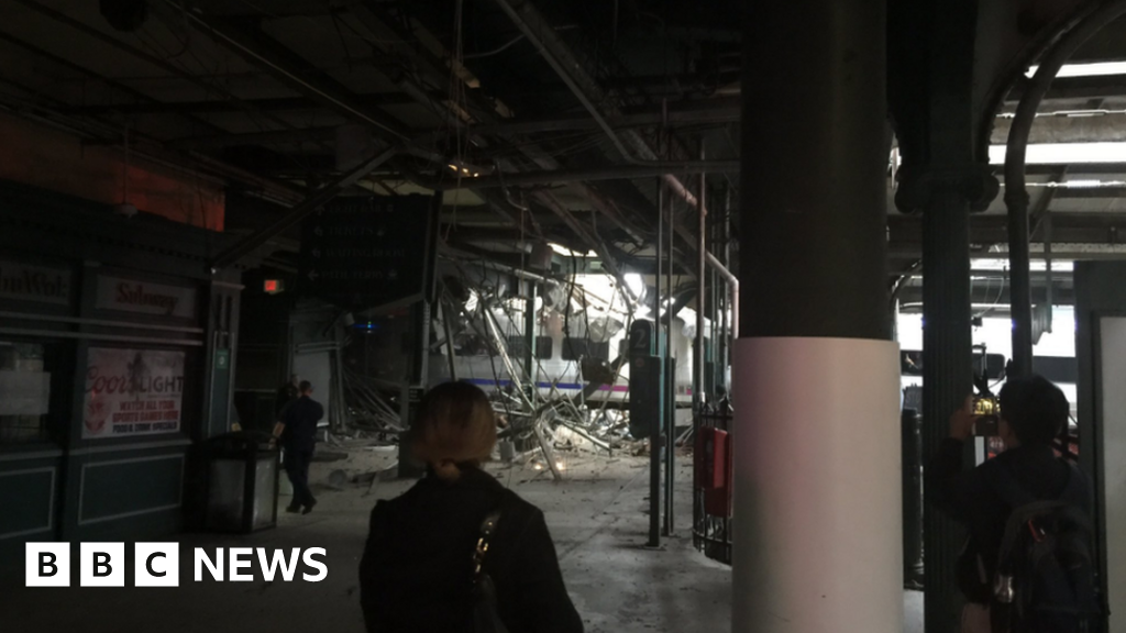 A derailed New Jersey Transit train is seen under a collapsed roof after it derailed and crashed into the station in Hoboken, New Jersey, U.S