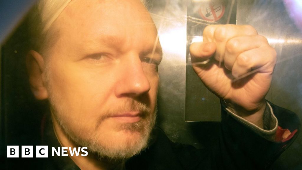 Julian Assange to stay in jail over fears escape diving