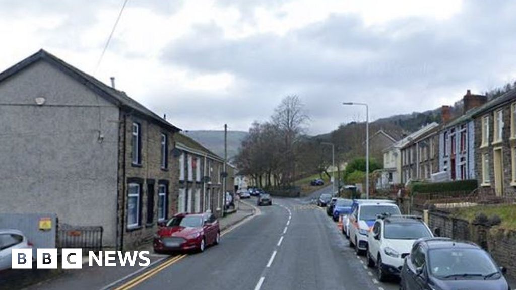 Rhondda house fire Man arrested after woman seriously hurt
