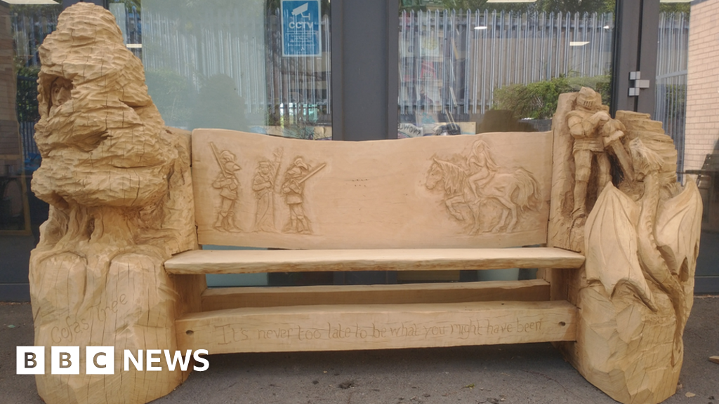Carved reading bench to get people in Coventry reading