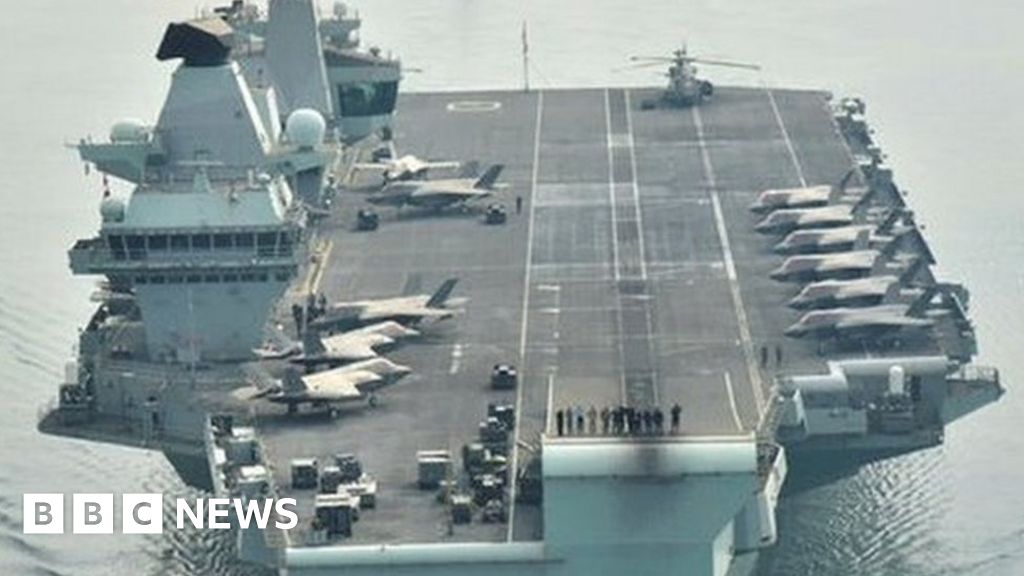 HMS Queen Elizabeth returns to Portsmouth minus £100m fighter jet