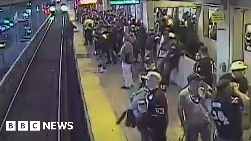 Last-second rescue after man falls on train tracks in California