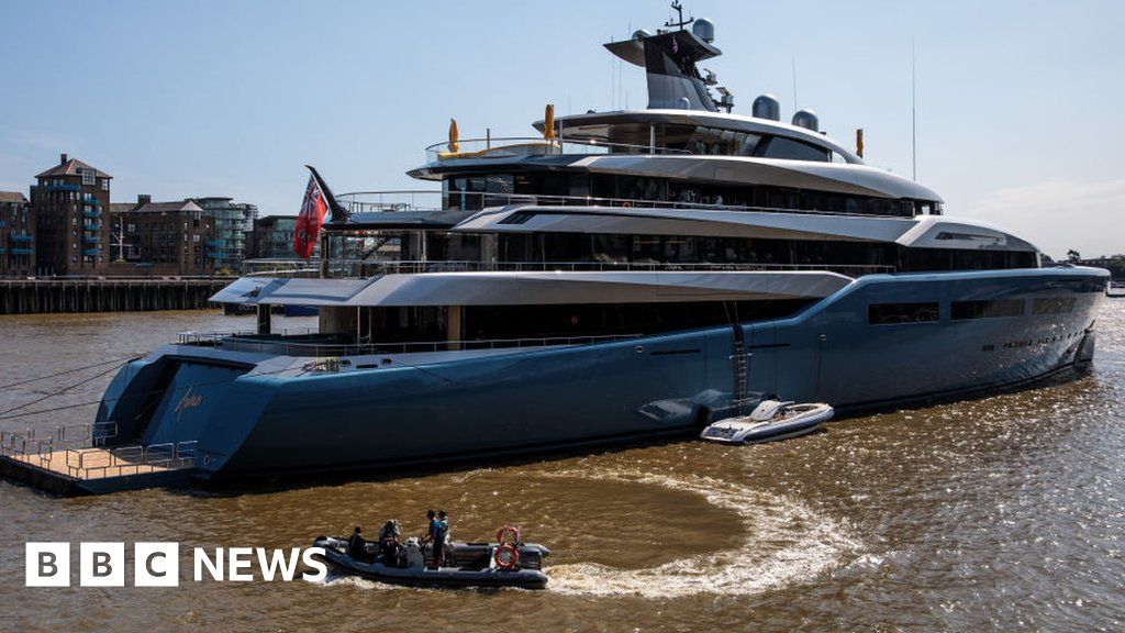 Joe Lewis: UK tycoon bailed in US fraud case but can't use superyacht