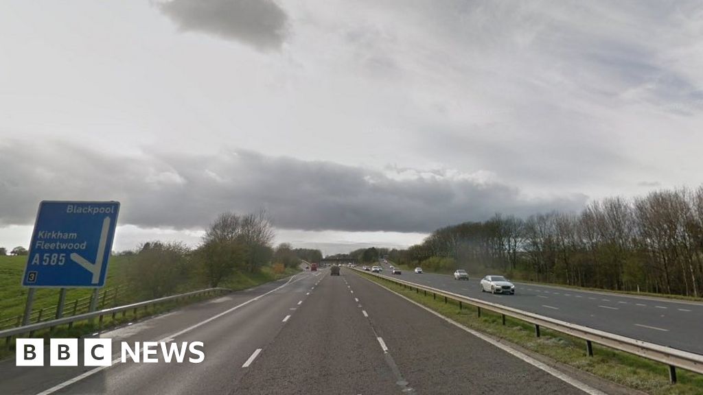 M55 crash Two arrested after motorcyclist dies BBC News