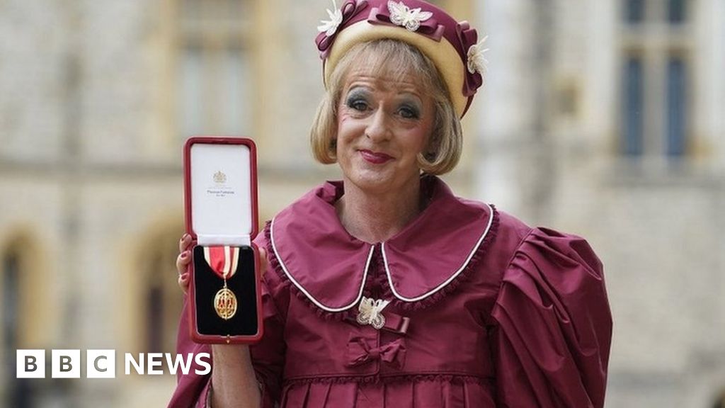 Grayson Perry accepts knighthood from Prince of Wales at Windsor Castle