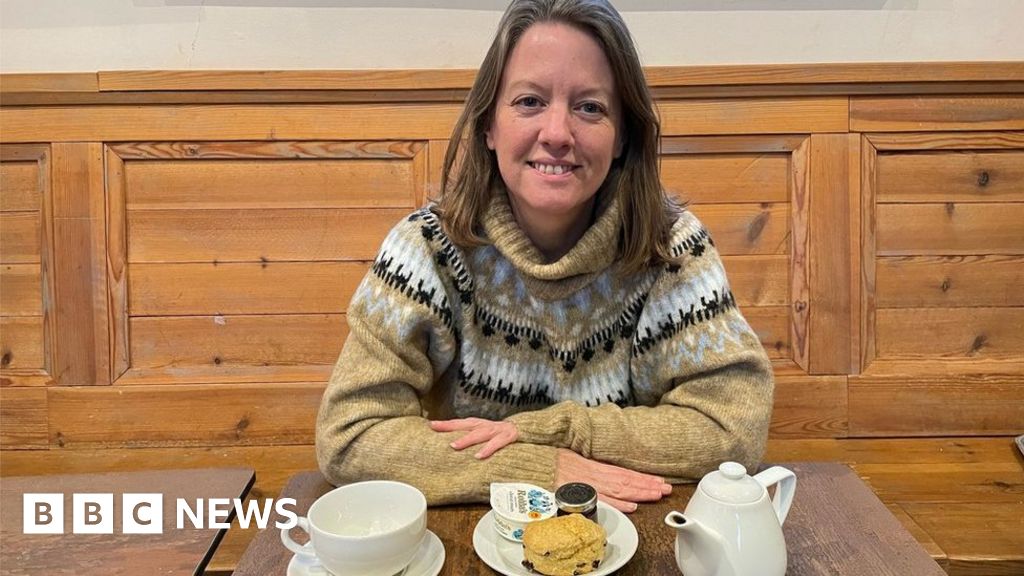 Woman completes National Trust scone-eating project