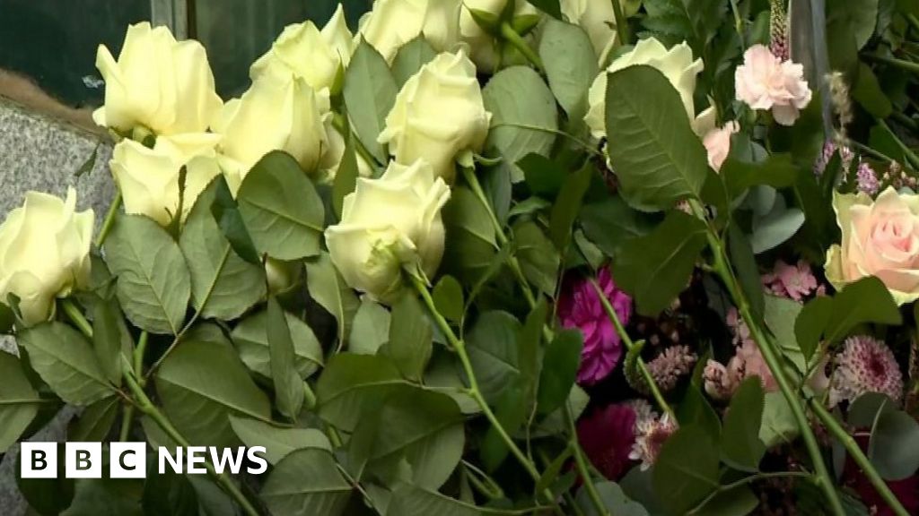 Omagh bomb Flowers laid at site of explosion 25 years on BBC News
