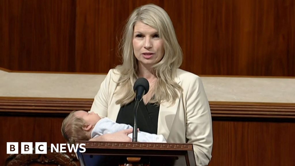 Moment US congresswoman brings baby to budget vote