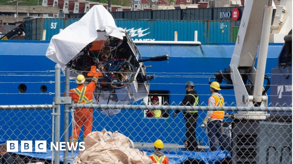 Titanic tourist sub photos show wreckage being brought ashore