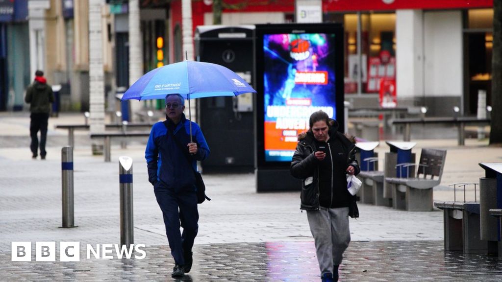 UK weather: Flood warnings in place as heavy rain and strong winds lash UK