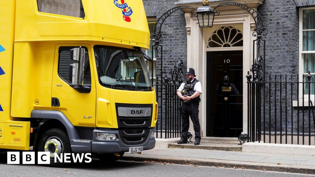 No 10 defends PM's holiday as removal vans seen in Downing Street