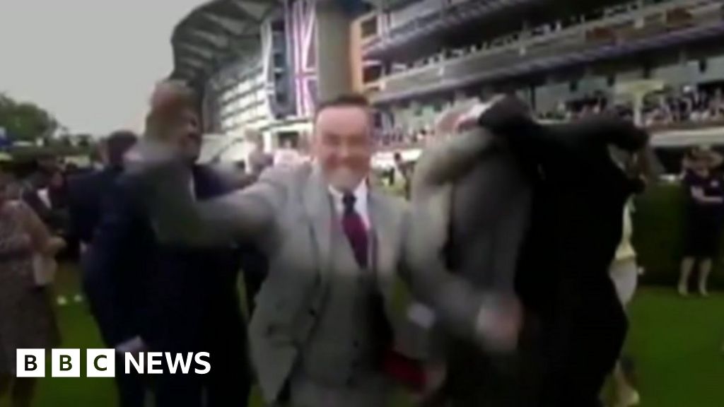 Sickie Policeman Seen On Tv Celebrating Racing Win Bbc News