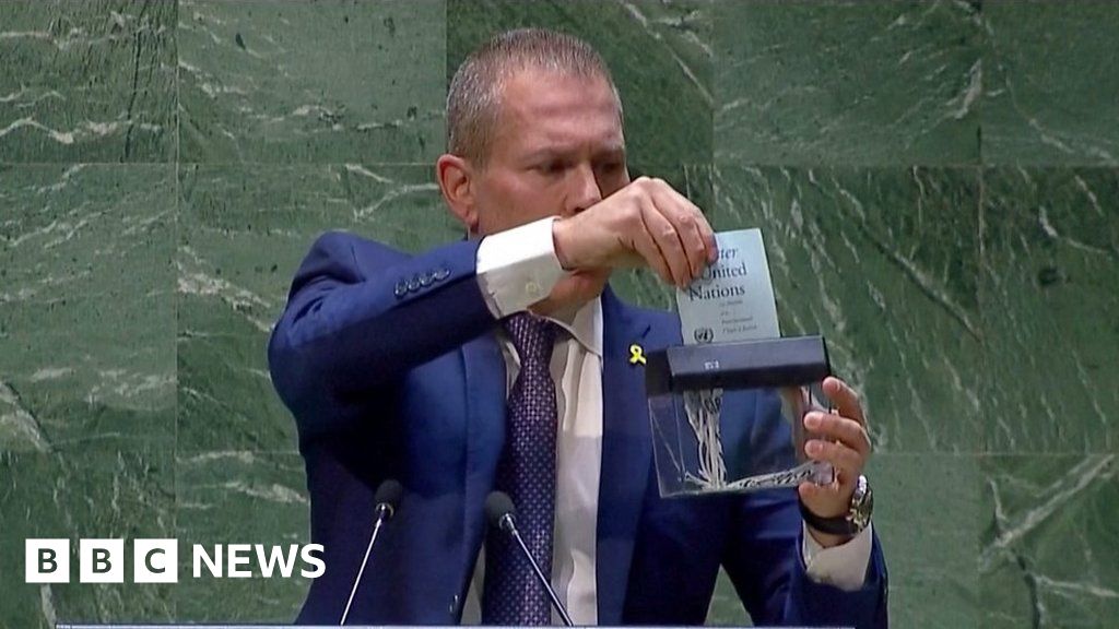 Israeli ambassador shreds UN charter with tiny shredder