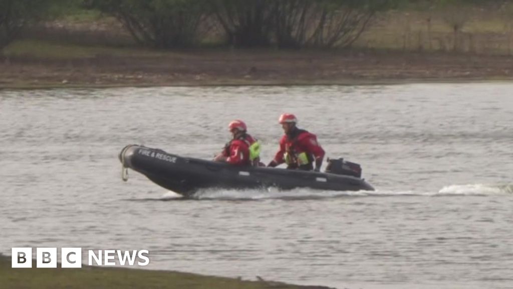 Two missing after boat capsizes on Devon lake