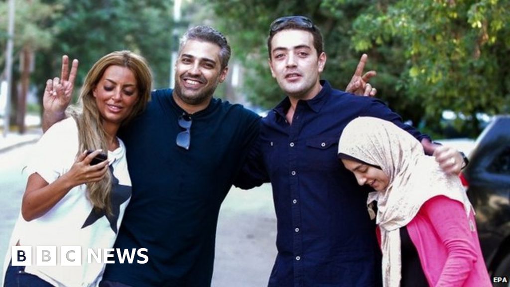 Al Jazeera Journalists Fahmy And Mohamed Freed In Egypt Bbc News 