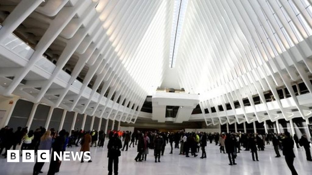New Yorkers and tourists get their first look inside the cathedral-like hall that sits atop the new $4 billion train station at the World Trade Center
