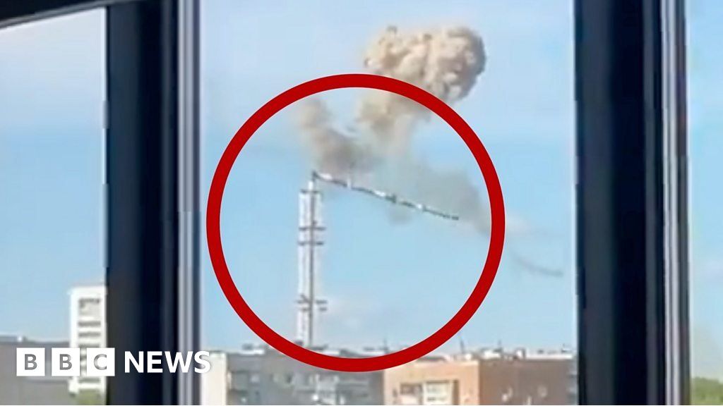 Moment Ukraine TV tower collapses after missile strike